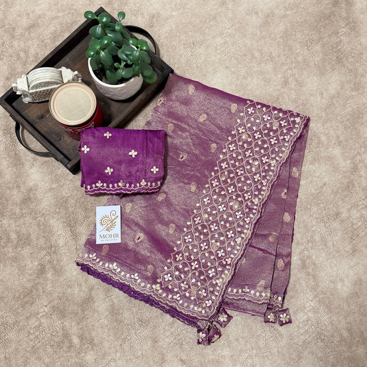 Zardozi and Gota Patti work on Purple Tissue saree