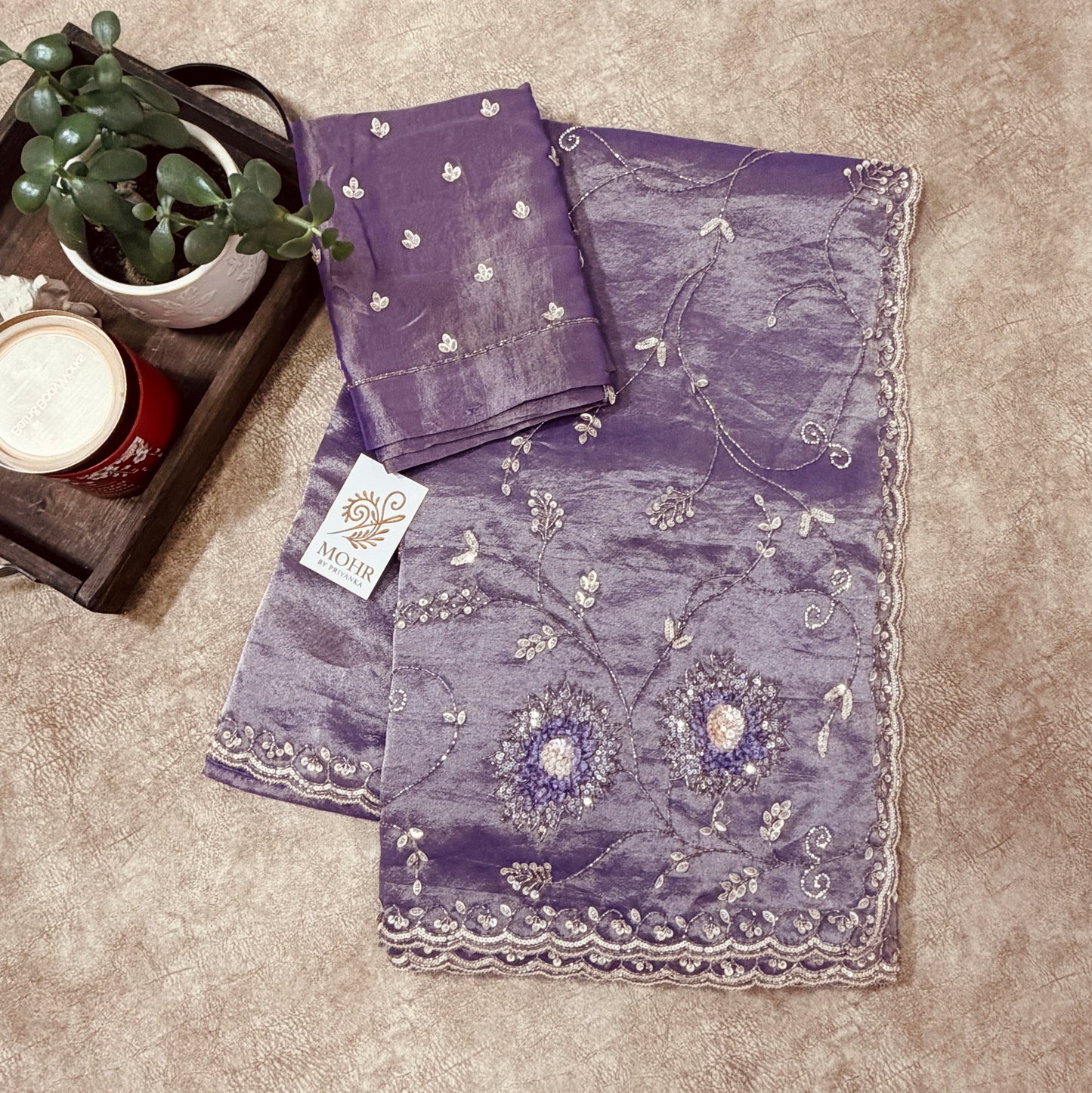 Zardozi work on shiny tissue silk saree