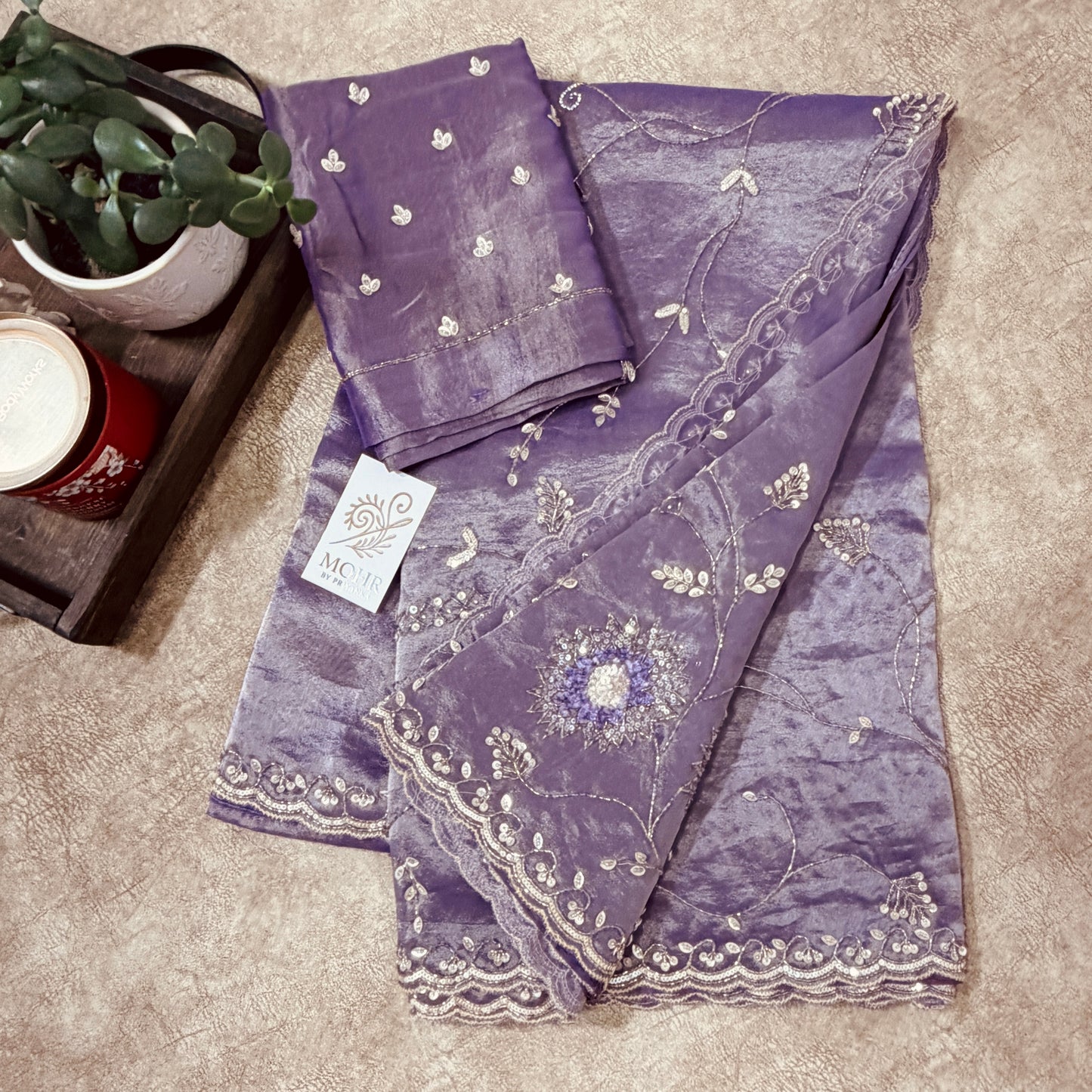Zardozi work on shiny tissue silk saree