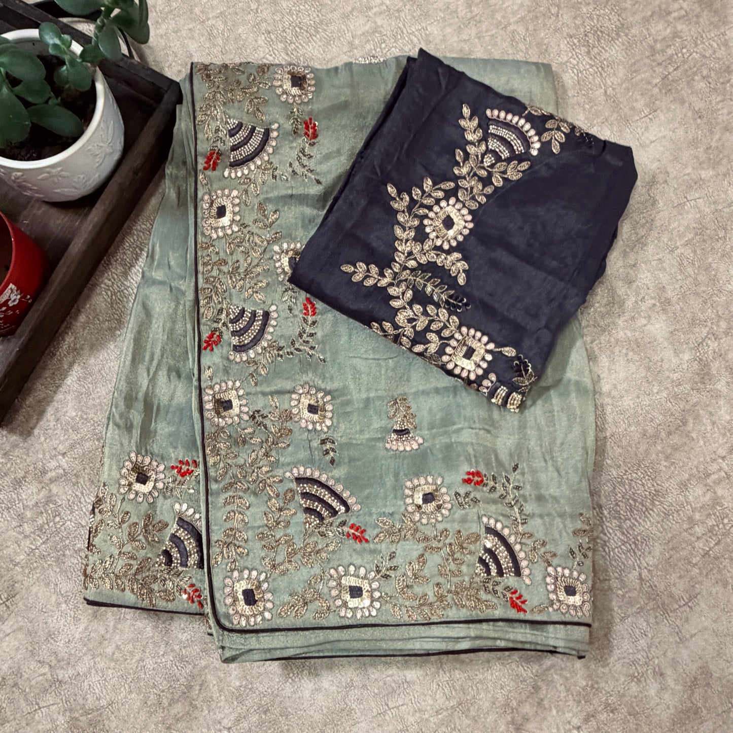 Zardozi work on Sea green tissue saree